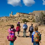 children hiking in the desert area