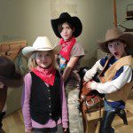 children dressed as cowboys and cowgirls
